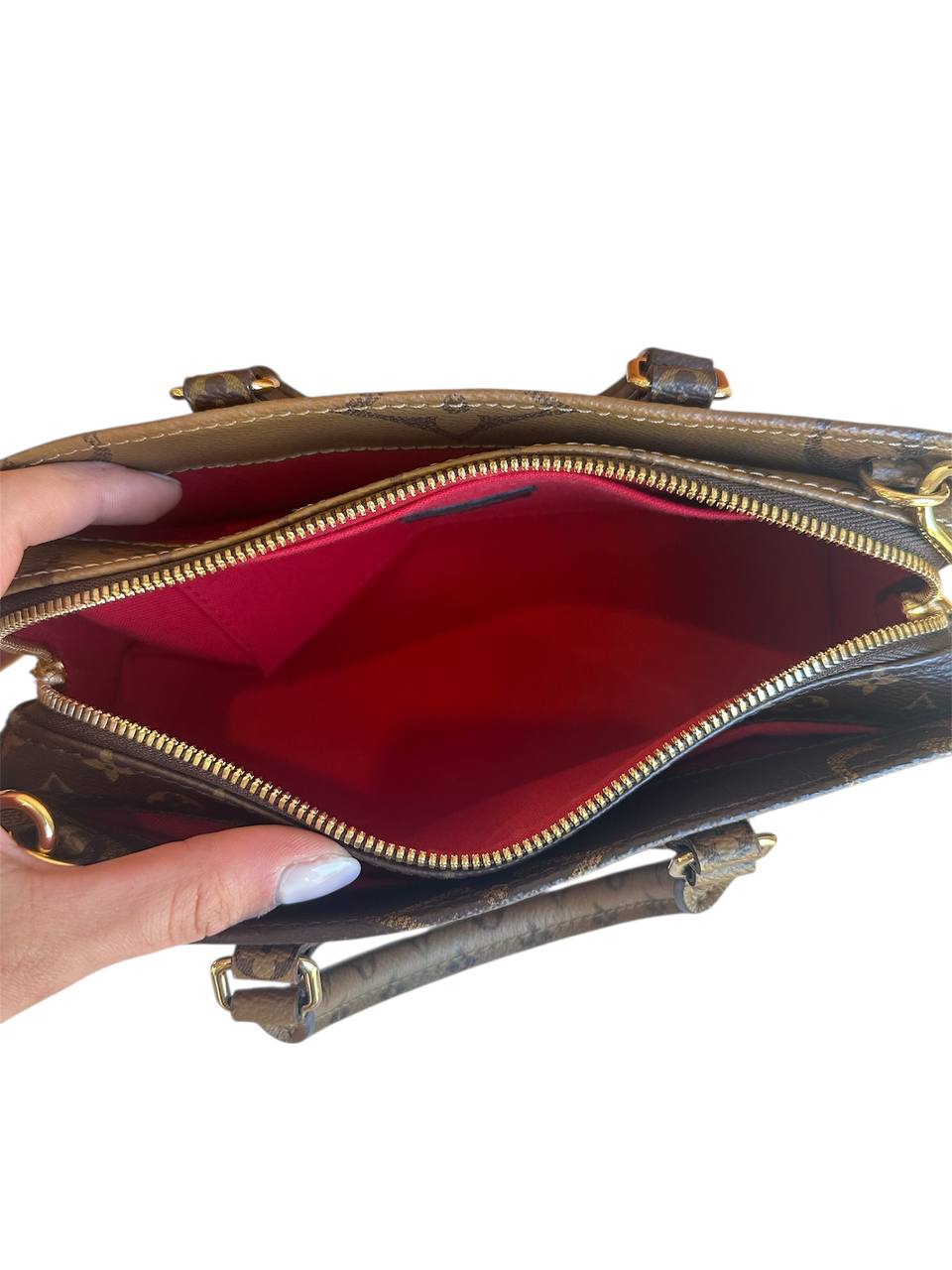 Louis Vuitton Onthego East West in tela monogram reverse